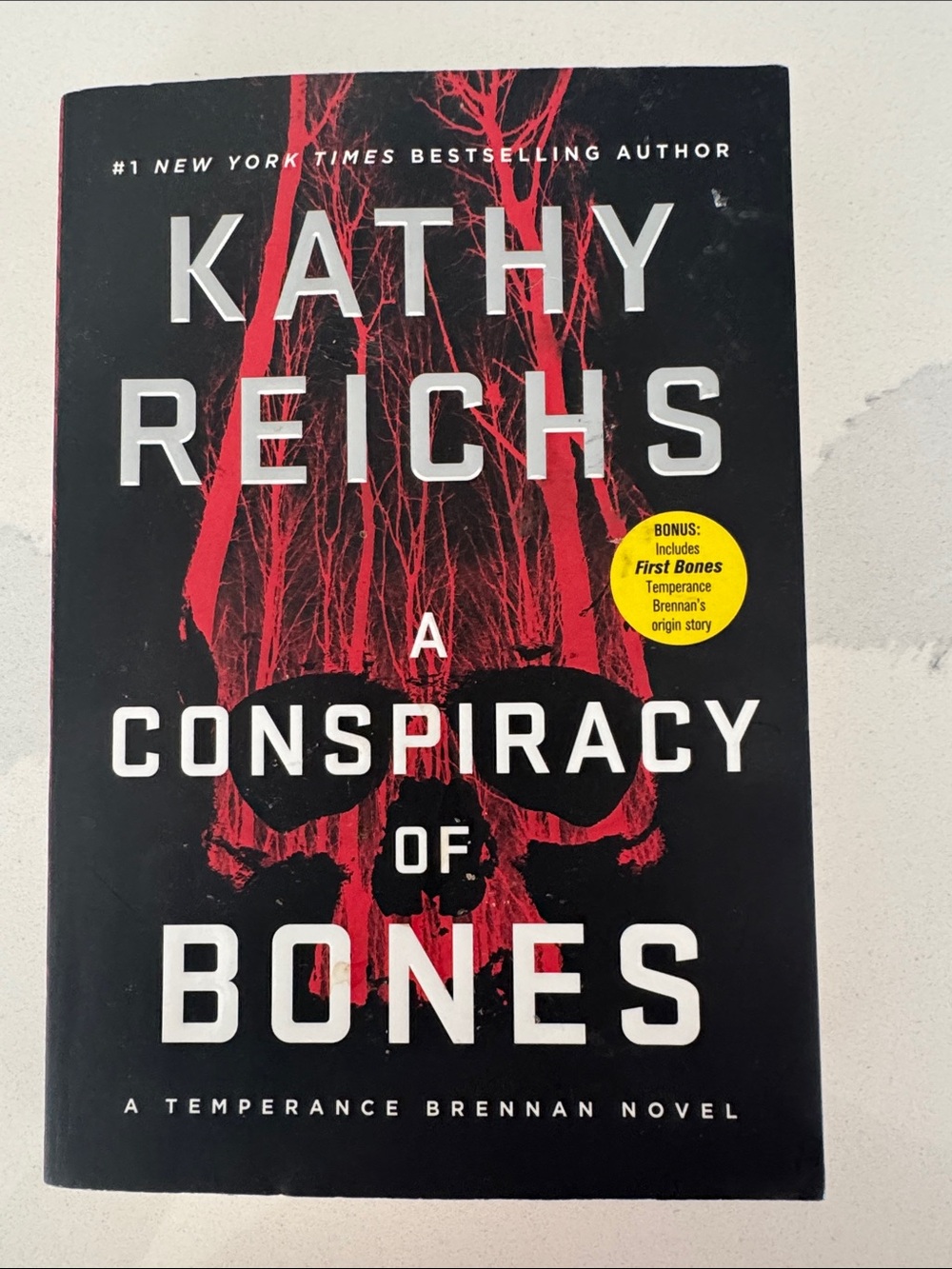 - A Conspiracy of Bones (Black/Red)